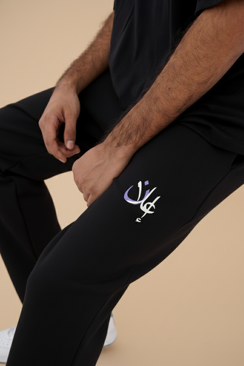 BLACK WAFFLE KNIT RELAXED-FIT TROUSERS