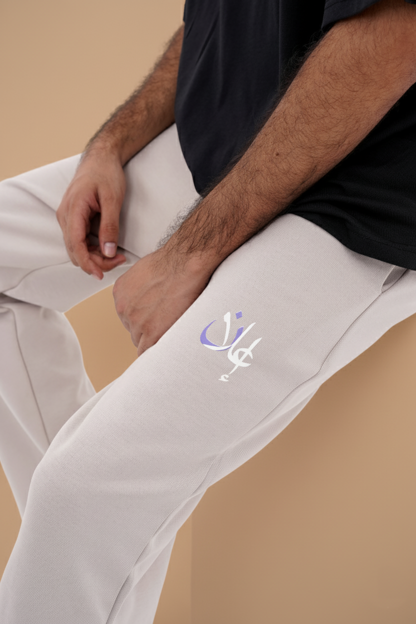 OFF-WHITE WAFFLE KNIT RELAXED-FIT TROUSERS